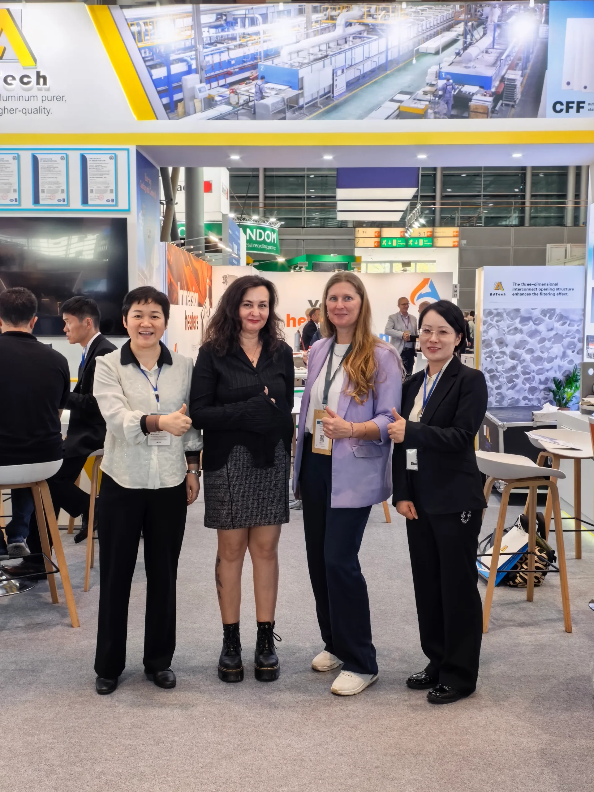 AdTech team with customers at ALUMINIUM 2026 in Düsseldorf
