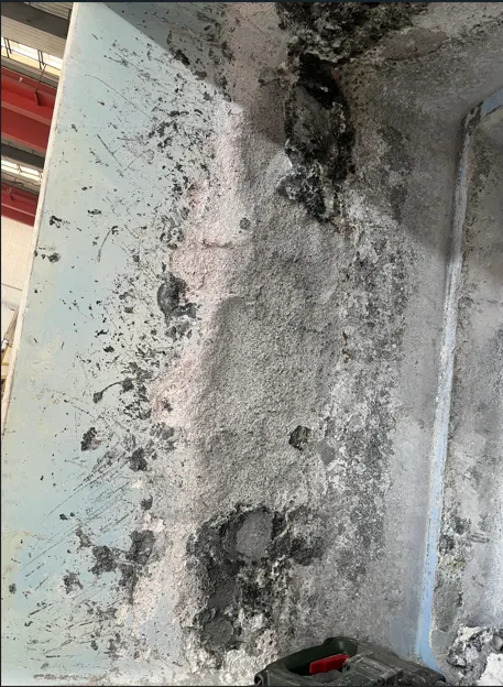 Refractory lining deterioration associated with high-magnesium aluminum alloy processing.
